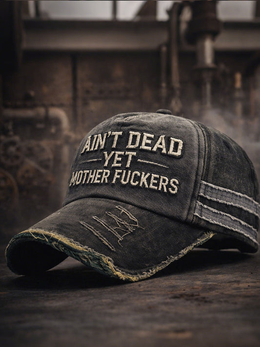 Ain't dead yet, motherfuckers Unisex hats